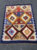 A woollen Kilim rug,