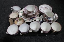 A tray of antique copper lustre china