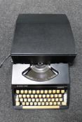 A cased Silver Reed Silvertec manual typewriter