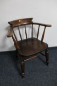 An antique captain's armchair.