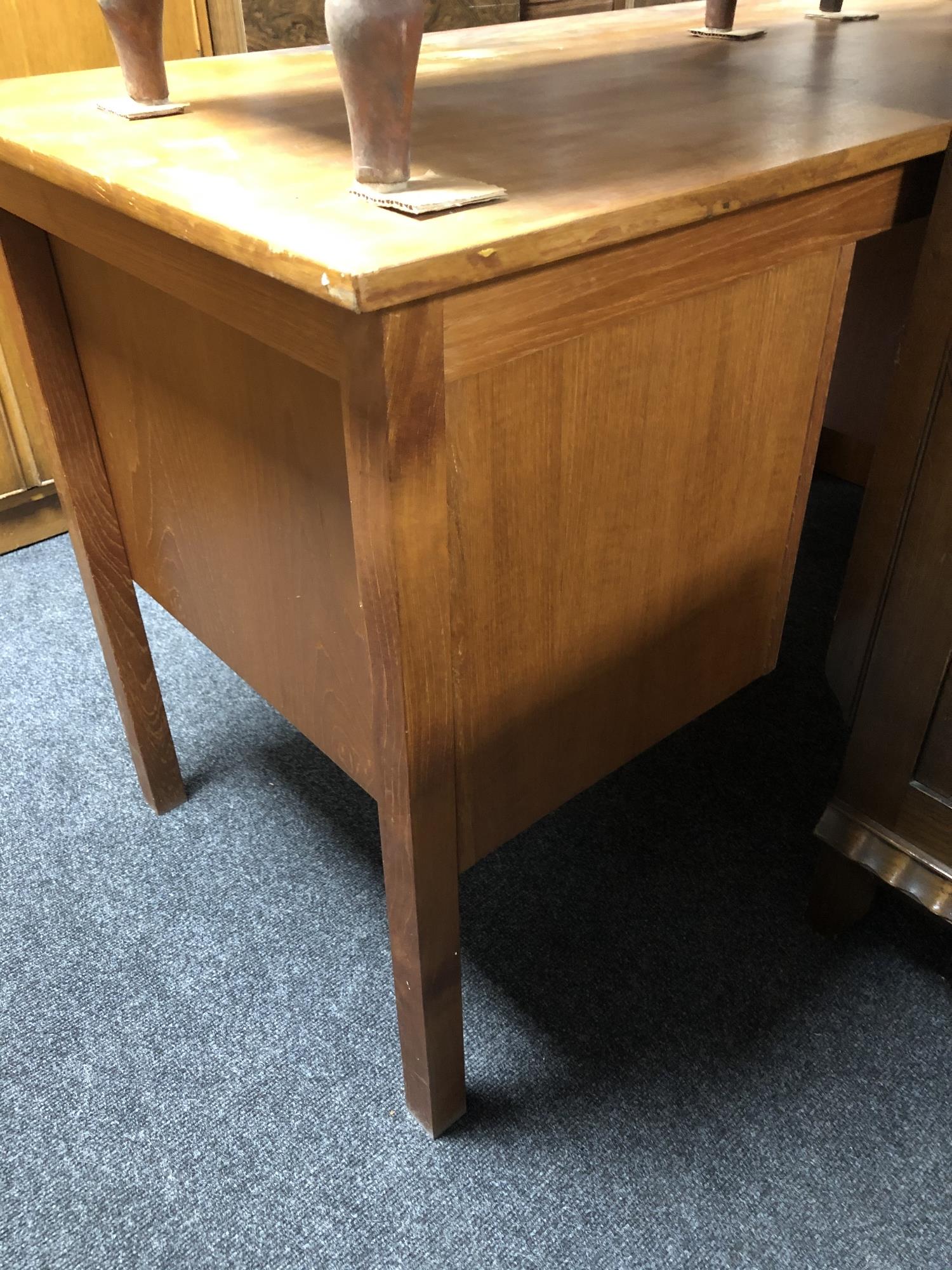 A mid 20th century teak twin pedestal writing desk and teak filing chest. - Image 8 of 8