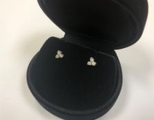 A pair of 18ct white gold diamond earrings