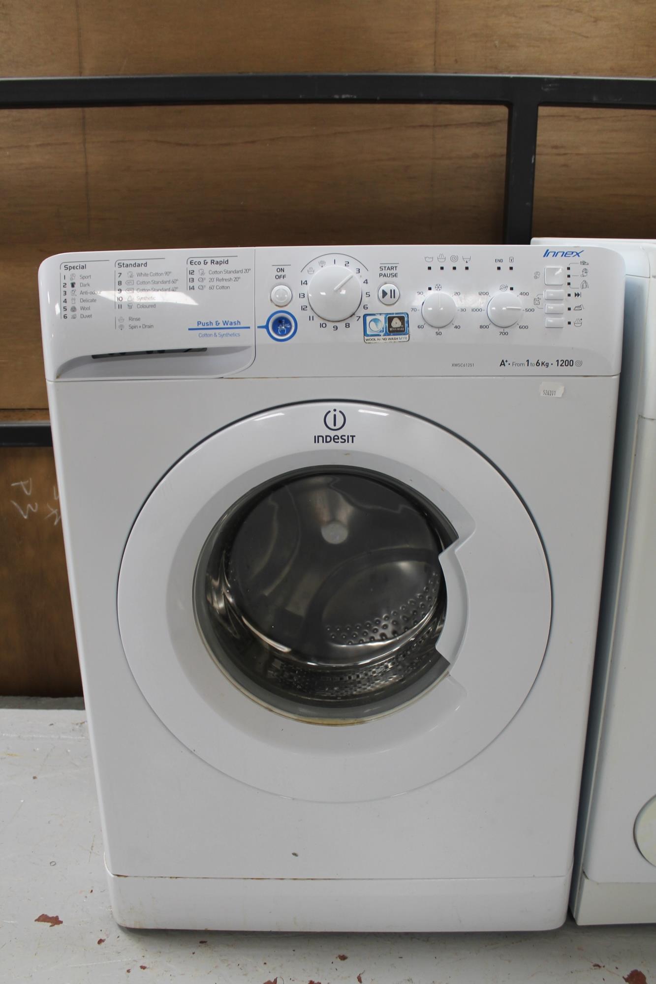 A Indesit washing machine.