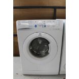 A Indesit washing machine.