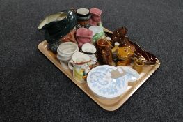 A tray of a collection of Toby jugs to include a large Royal Doulton Pied Piper,