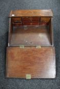 An antique oak table top clerk's desk fitted six internal drawers