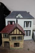 Two early 20th century dolls houses