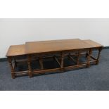 An oak Old Charm coffee table fitted two tables beneath.