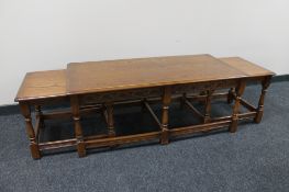 An oak Old Charm coffee table fitted two tables beneath.