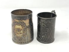 Two antique silver tankards