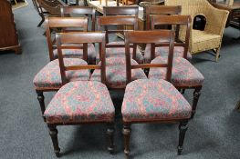 A set of eight Victorian mahogany dining room chairs.