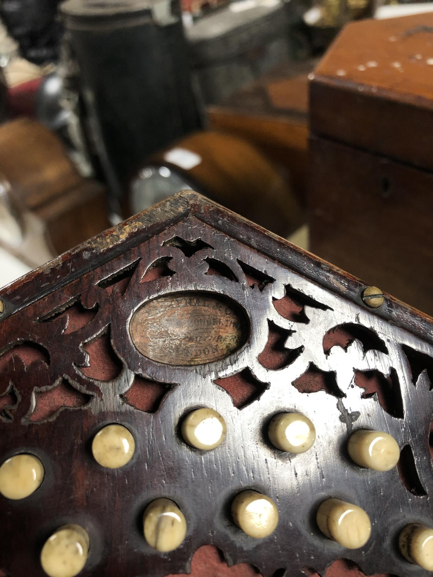 An antique English concertina with rosewood fretwork ends labelled Lachenal & Co, - Image 2 of 13