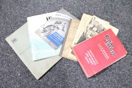 A box of a small quantity of vintage car and motorbike manuals including Royal Enfield,