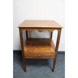 A George III mahogany side table fitted a drawer.