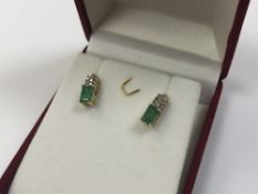 A pair of 10ct yellow gold emerald and diamond earrings CONDITION REPORT: 1.8g.