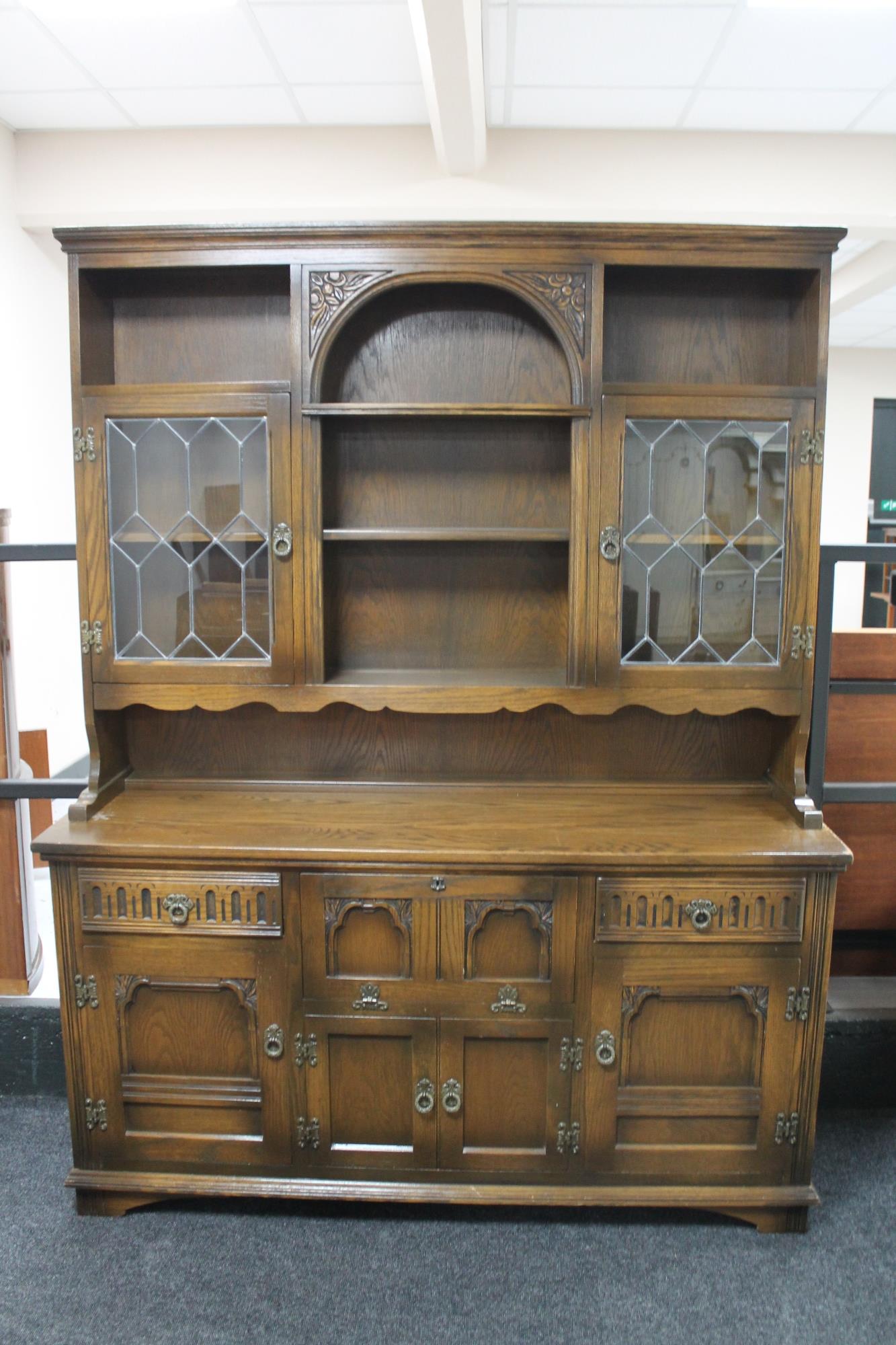An eight piece Old Charm dining room suite comprising dresser, refectory table and six chairs. - Image 2 of 2