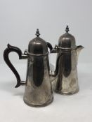 A silver coffee pot and matching water jug, Birmingham marks CONDITION REPORT: 1260g.