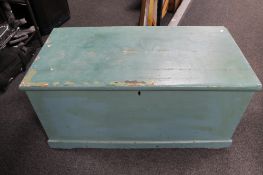 An early 20th century painted pine blanket box.