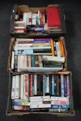 Three boxes of hardback and paperback books, novels,