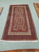 A Persian rug, on red ground,