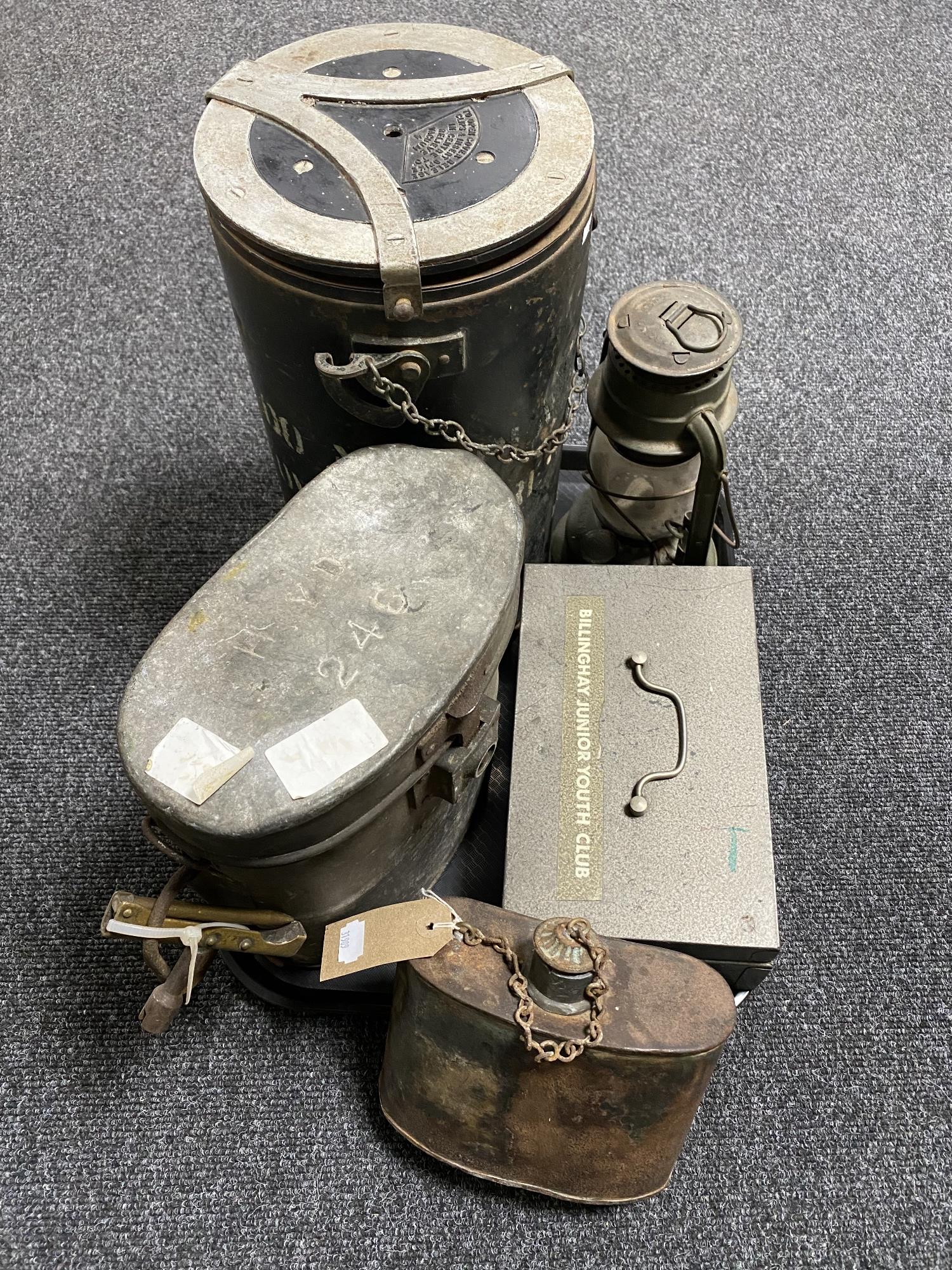A tray of two vintage military ration tins, canteen,