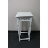 A painted shabby chic plant table.