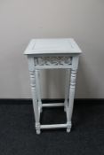 A painted shabby chic plant table.