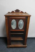 A late Victorian mahogany music cabinet.