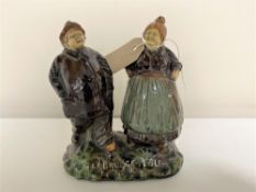 A 19th century continental pottery figure group