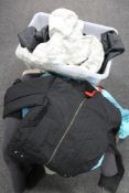 A box and crate of assorted clothing, Berghaus coat,