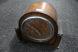 A 1930's oak Smiths Enfield mantel clock