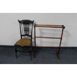 A Victorian bedroom chair and a stained towel rail.