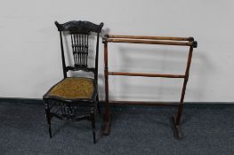 A Victorian bedroom chair and a stained towel rail.