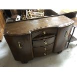 A 1930's oak shaped front sideboard.