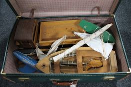 A mid 20th century luggage case, pond yacht,