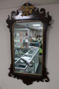 An antique mahogany Chippendale style wall mirror