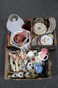 Three boxes of assorted china, wall plates, figurines,