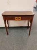 An Edwardian inlaid mahogany tea table, width 92 cm.