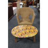 An oversized wicker armchair and a teak coffee table with Marilyn Monroe themed top