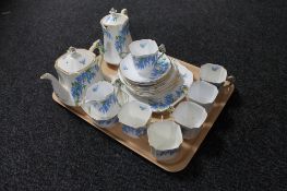 A tray of twenty-three piece English Art Deco bone china tea service
