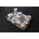 A tray of twenty-three piece English Art Deco bone china tea service