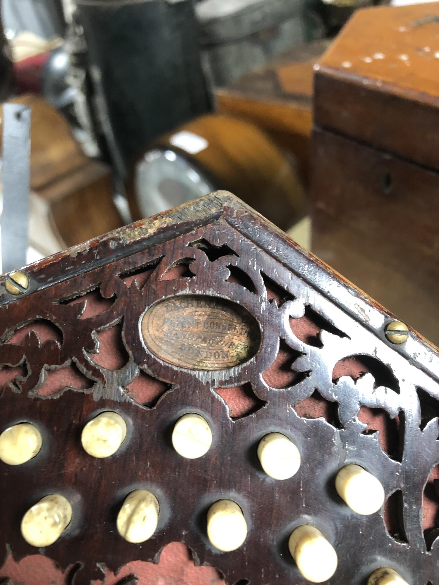 An antique English concertina with rosewood fretwork ends labelled Lachenal & Co, - Image 3 of 13