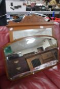 An Edwardian mahogany framed mirror and dressing table mirror.