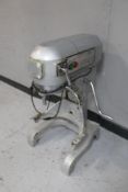 A commercial food mixer (no accessories).