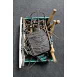 A box of antique and later metal ware, garden wall brackets, fire grate, cast iron plaque,