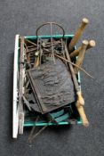 A box of antique and later metal ware, garden wall brackets, fire grate, cast iron plaque,