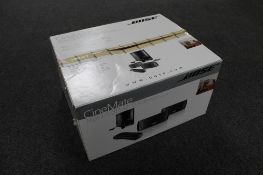 A boxed Bose Cinemate digital home theatre speaker system with remote