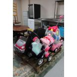 A pallet of children's toys including electric car, Fisher Price trike, doll's pram, soft toys etc.