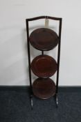 A Victorian mahogany folding cake stand