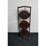 A Victorian mahogany folding cake stand